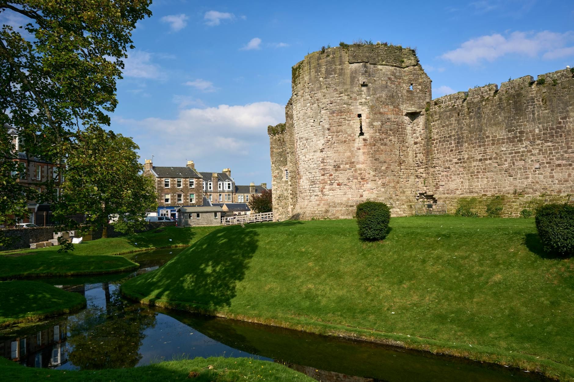 rothesay castle in scotland with scenic landscape